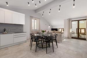 Kuchyňa alebo kuchynka v ubytovaní Apartmani Đogaš