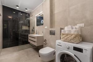 Kúpeľňa v ubytovaní Apartmani Đogaš