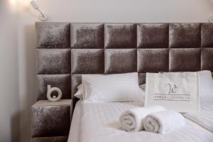 Posteľ alebo postele v izbe v ubytovaní Apartmani Đogaš