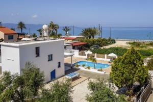 A view of the pool at Villa Alexelio by Villa Plus or nearby