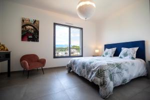 Posteľ alebo postele v izbe v ubytovaní Domaine d'Arca Porto Vecchio - Hugo 13 - Toit Terrasse - Haut standing
