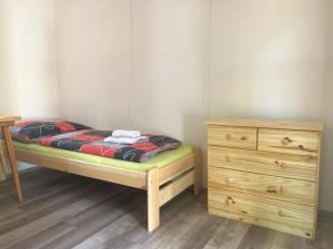 Posteľ alebo postele v izbe v ubytovaní Chatová osada Zelený Háj