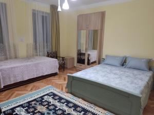 Voodi või voodid majutusasutuse Aloni Green Acres toas