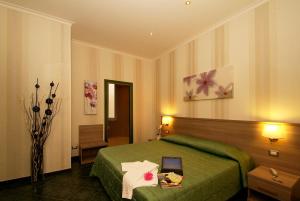 Posteľ alebo postele v izbe v ubytovaní Hotel Argentina