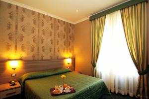 Posteľ alebo postele v izbe v ubytovaní Hotel Argentina