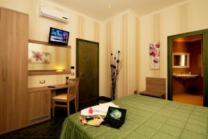 Posteľ alebo postele v izbe v ubytovaní Hotel Argentina