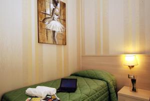 Posteľ alebo postele v izbe v ubytovaní Hotel Argentina