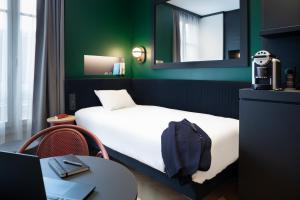 Voodi või voodid majutusasutuse ibis Styles Dijon Central toas