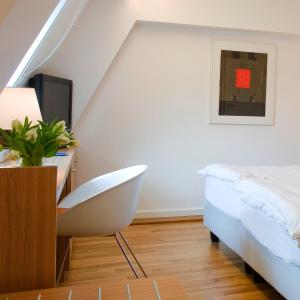 Ένα ή περισσότερα κρεβάτια σε δωμάτιο στο Hotel Simoncini