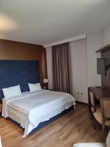 Postel nebo postele na pokoji v ubytování Golden Ring Resort