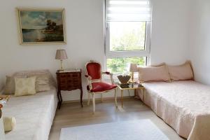 Ένα ή περισσότερα κρεβάτια σε δωμάτιο στο Private House