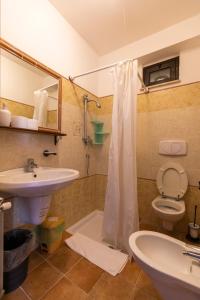 Kylpyhuone majoituspaikassa Villa Basilio Accommodation