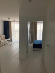 Ένα ή περισσότερα κρεβάτια σε δωμάτιο στο Rogowo Pearl 3303
