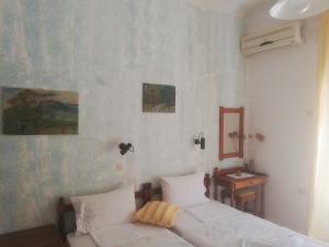 Postel nebo postele na pokoji v ubytování Atlantis Hotel
