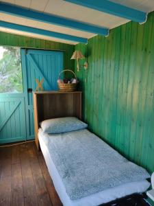 Ein Bett oder Betten in einem Zimmer der Unterkunft Yogaville Sardegna