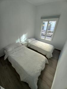 Postel nebo postele na pokoji v ubytování All Season Flat