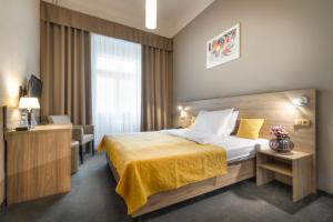 Postel nebo postele na pokoji v ubytování Atlantic Hotel