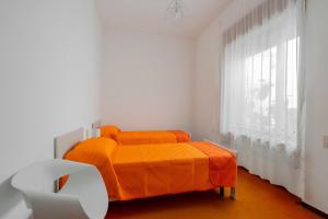 Postel nebo postele na pokoji v ubytování Casa Lilli 11 posti