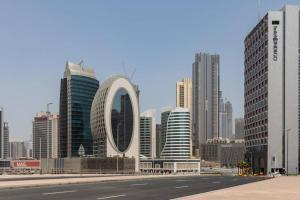 a view of a city with tall buildings at Frank Porter - The Vogue in Dubai