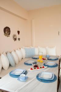 A bed or beds in a room at Katerina's Luxury Apartment