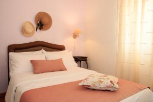 A bed or beds in a room at Katerina's Luxury Apartment