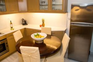 A kitchen or kitchenette at Katerina's Luxury Apartment