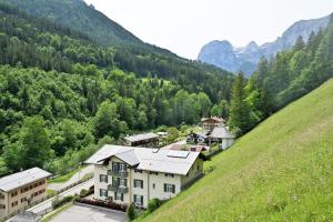 an aerial view of a village in the mountains at Gasthof Oberwirt in Ramsau