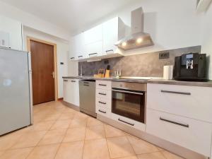 Kuchyň nebo kuchyňský kout v ubytování Apartment Morska oaza + 10 fotografií