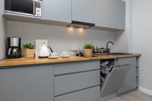 Fotografia z galérie ubytovania Apartament Baltic Gray Pobierowo v destinácii Pobierowo + 23 fotografií