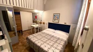 Postel nebo postele na pokoji v ubytování Residence Al Lago