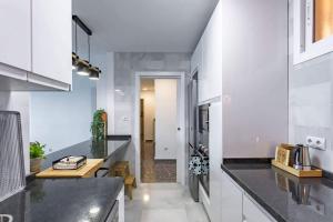 Kuchyňa alebo kuchynka v ubytovaní Apartamento El Palmer