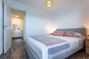 Posteľ alebo postele v izbe v ubytovaní Apartamento El Palmer