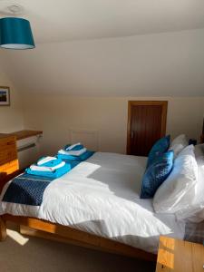 Postel nebo postele na pokoji v ubytování Apartment 2, Craigmore, Upper Baila, Lerwick