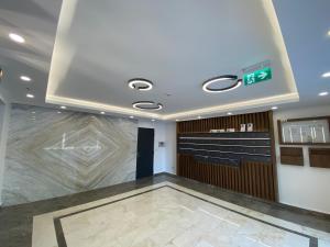a lobby of a building with a waiting room at Luxury Studio Solid Butoaie in Mamaia