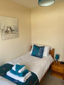 Postel nebo postele na pokoji v ubytování Apartment 2, Craigmore, Upper Baila, Lerwick