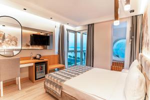 Postel nebo postele na pokoji v ubytování PEARLY HOTEL + 37 fotografií
