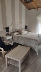 En eller flere senge i et værelse på Veiga da Porta - Casa Rural + 30 billeder