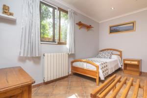 Postel nebo postele na pokoji v ubytování Cas Conill