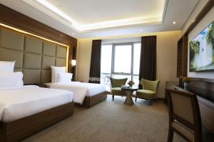 Letto o letti in una camera di Weekend Hotel Sari