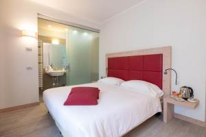 Postel nebo postele na pokoji v ubytování Albergo Monte Giove