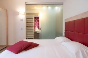 Postel nebo postele na pokoji v ubytování Albergo Monte Giove