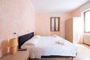 Postel nebo postele na pokoji v ubytování Albergo Monte Giove