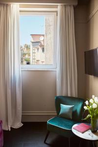 Posezení v ubytování HOTEL VITE - By Naman Hotellerie