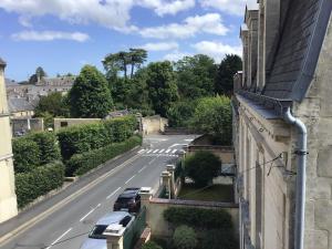 a view of a street from a building at Maison De ville Bayeux in Bayeux