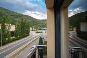 Nespecifikovaný výhled na hory nebo výhled na hory při pohledu z apartmánu + 2 fotografie