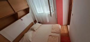 Postel nebo postele na pokoji v ubytování Villa Rab Robert