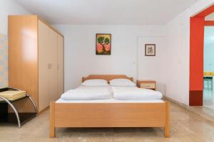 Postel nebo postele na pokoji v ubytování Apartment Milka