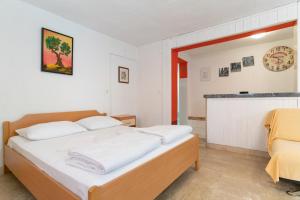 Postel nebo postele na pokoji v ubytování Apartment Milka