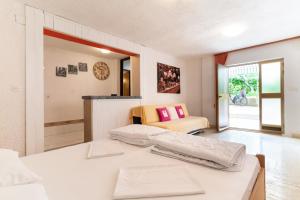 Postel nebo postele na pokoji v ubytování Apartment Milka