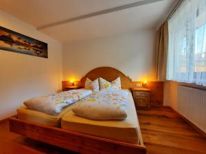 Postel nebo postele na pokoji v ubytování Haus Bergblick